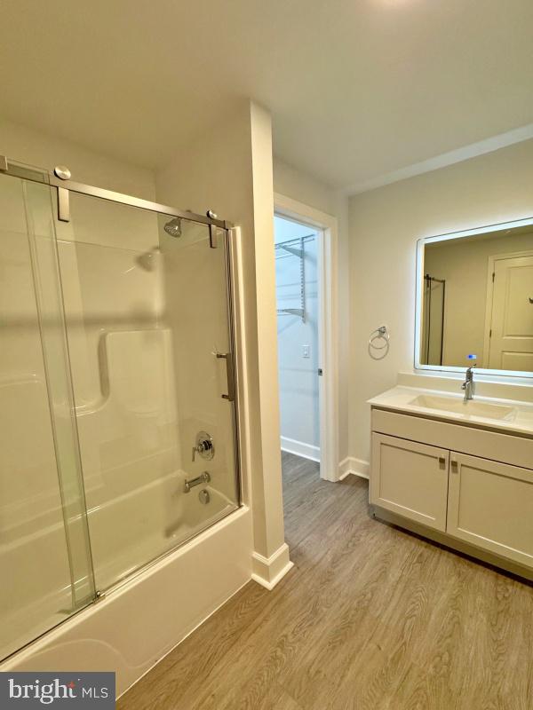 50 North Duke Street, Unit 305 York, PA 17401 - Photo 8 of 10 a spacious bathroom with a granite countertop tub shower sink and mirror
