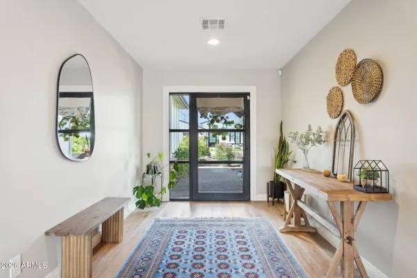 a room with a table and a window