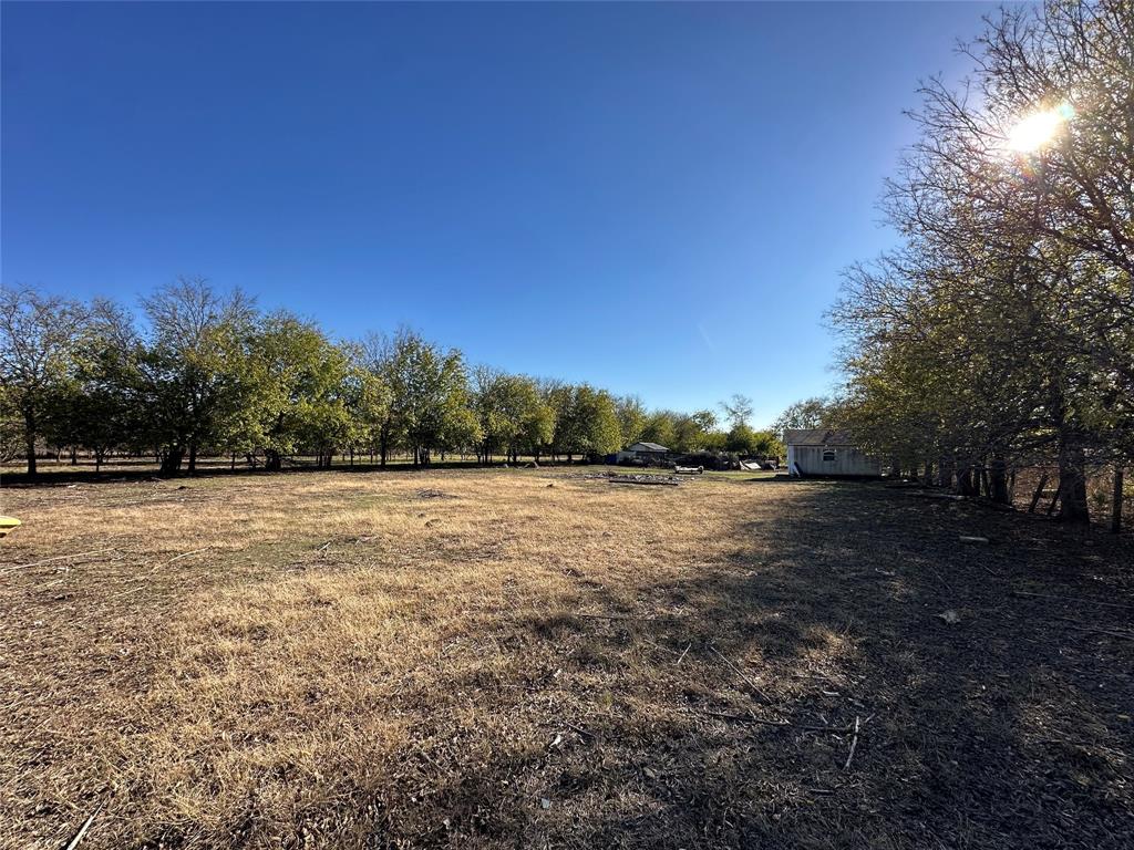 1314 Old Country Road Moody, TX 76557 - Photo 11 of 12 a view of outdoor space with green field and trees