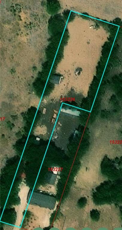 1314 Old Country Road Moody, TX 76557 - Photo 12 of 12 a backyard of a house with plants