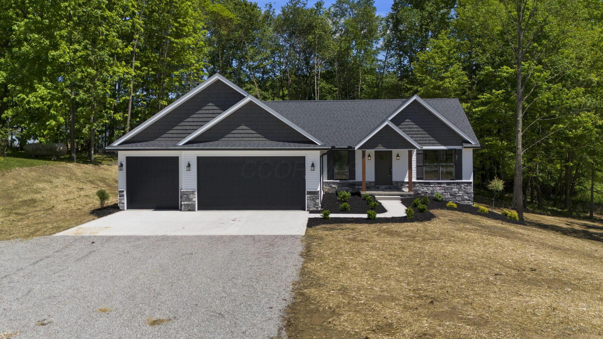 14362 Monroe Mills Road Howard, OH 43028 - Photo 2 of 53 44-web-or-mls-DJI_20260528112843_0025_D