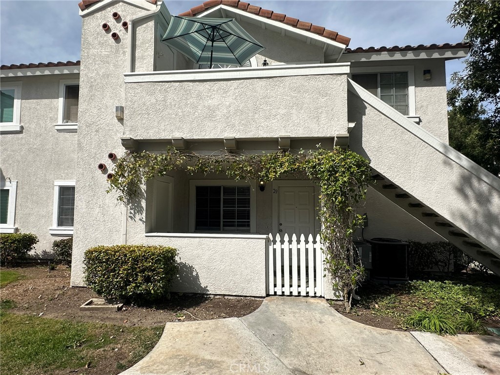 29 Picazo Rancho Santa Margarita, CA 92688 - Photo 1 of 1 a front view of a house with a garage