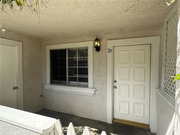 a bathroom with a window and a sink