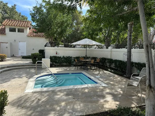 a view of a house with sitting area and furniture
