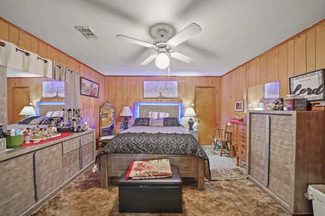 a living room with stainless steel appliances kitchen island granite countertop furniture and a kitchen view