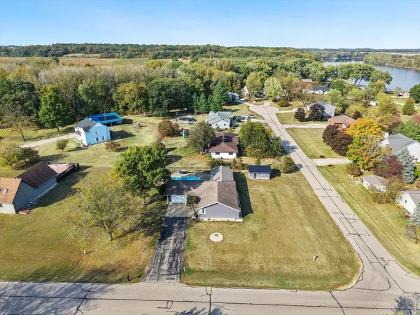 a view of a livingroom with furniture and a fireplace
