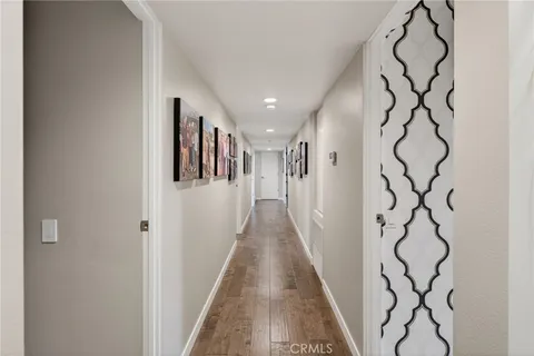 an aerial view of a house with a lake view