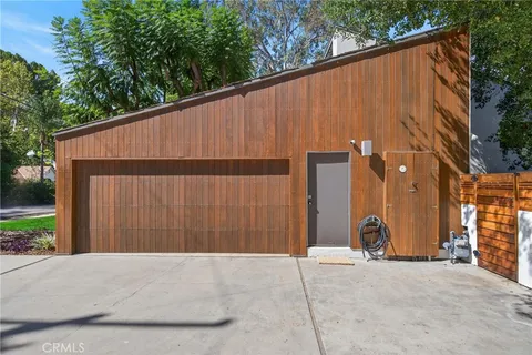 a view of balcony with furniture