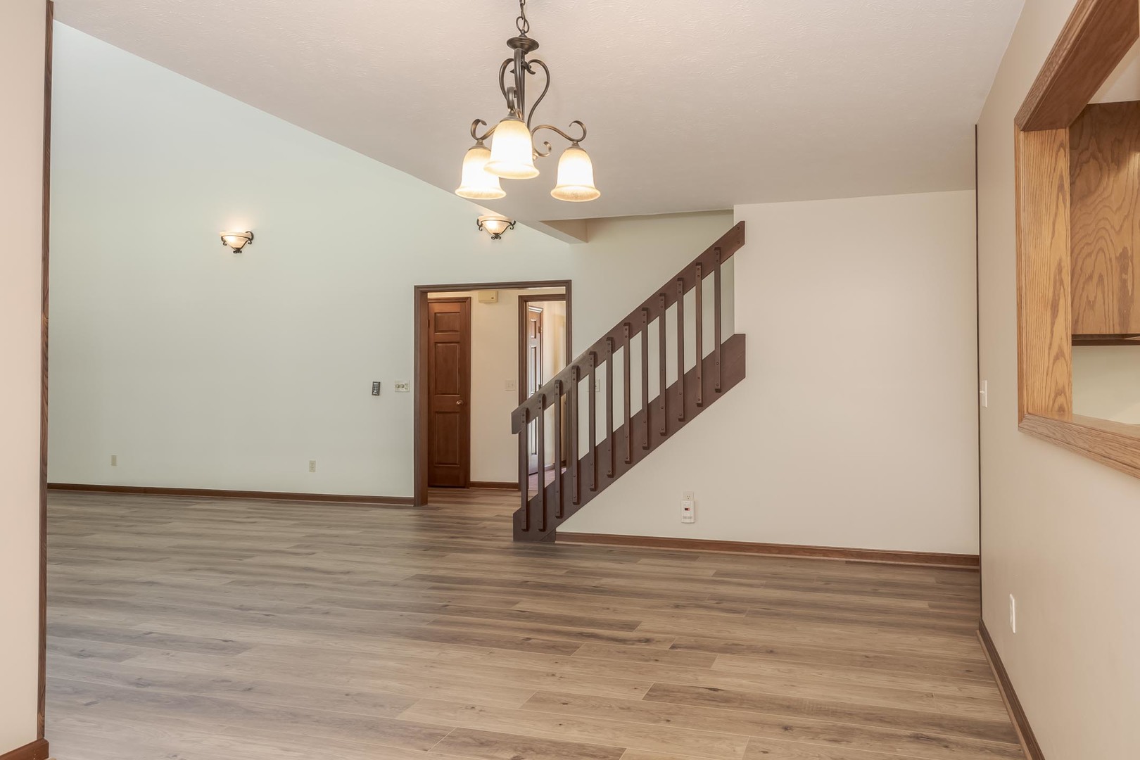 905 Rhymer Drive Normal, IL 61761 - Photo 12 of 47 a view of empty room with wooden floor and fan