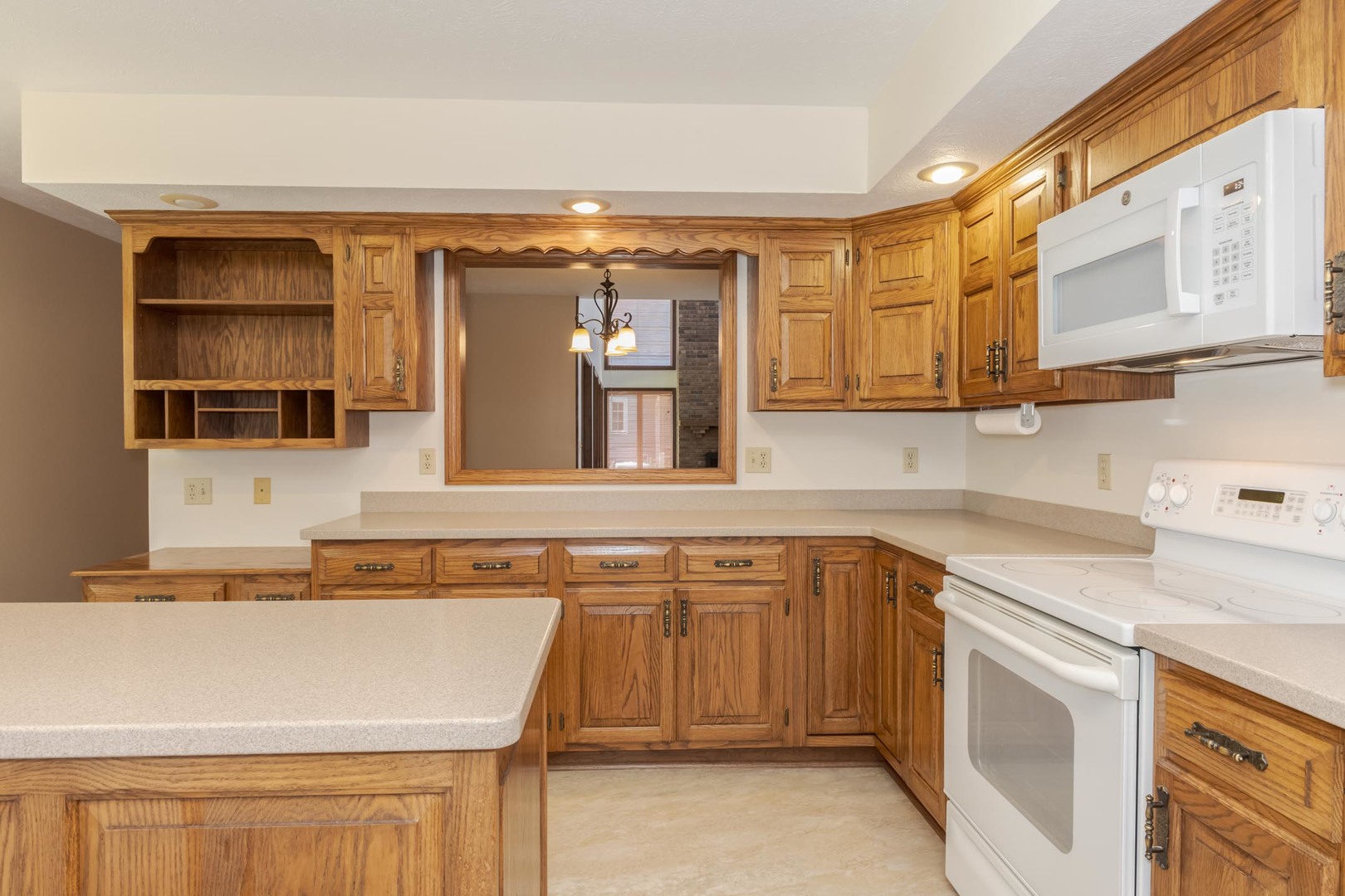 905 Rhymer Drive Normal, IL 61761 - Photo 17 of 47 a kitchen with a sink and cabinets