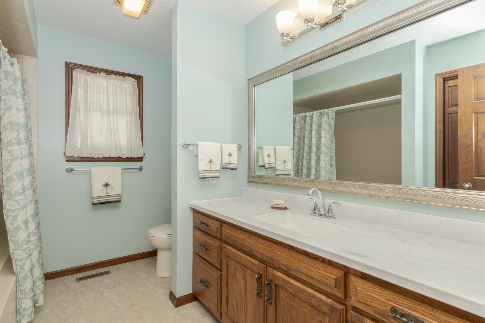 905 Rhymer Drive Normal, IL 61761 - Photo 24 of 47 a bathroom with a sink and a mirror