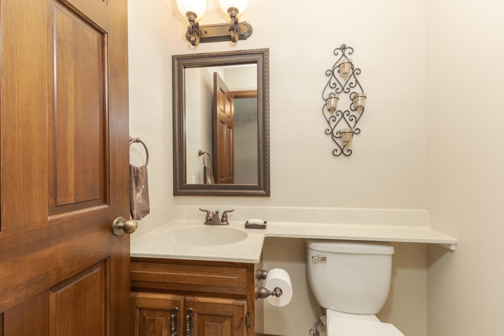 905 Rhymer Drive Normal, IL 61761 - Photo 26 of 47 a bathroom with a toilet sink and mirror