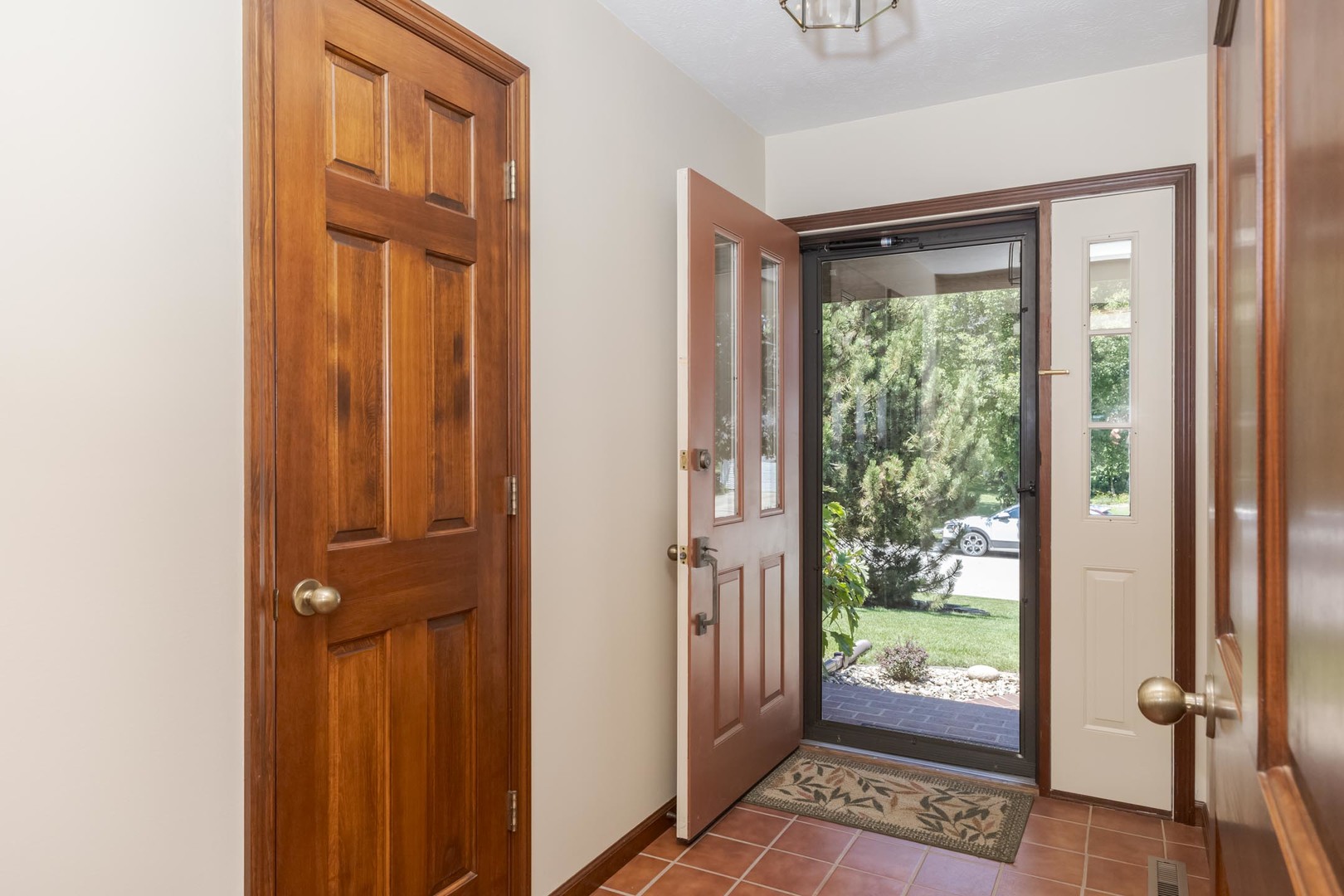 905 Rhymer Drive Normal, IL 61761 - Photo 3 of 47 a view of front door with wooden floor