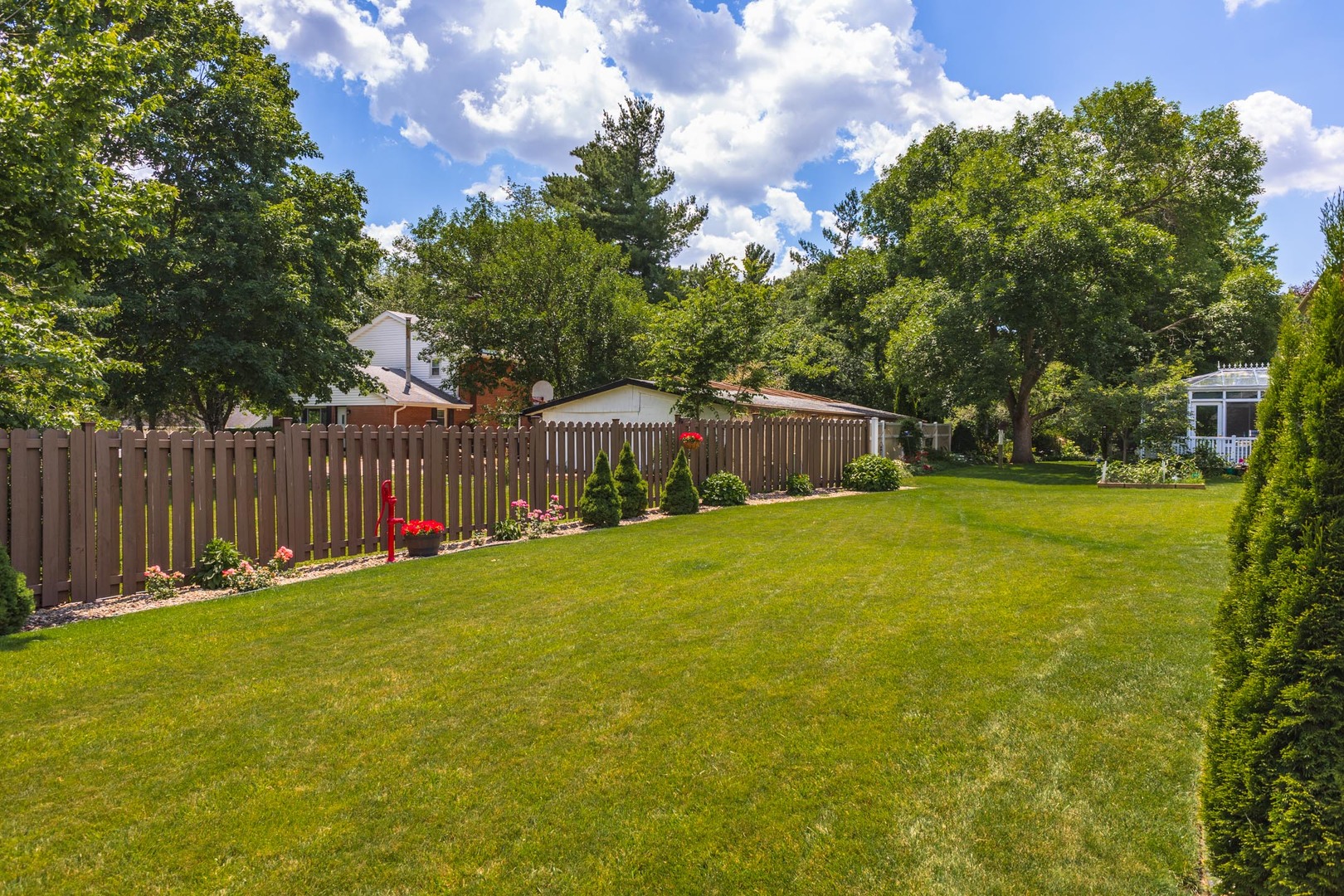 905 Rhymer Drive Normal, IL 61761 - Photo 44 of 47 a view of a house with backyard and sitting area