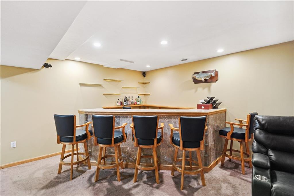 122 Walnut Circle Elizabeth, PA 15037 - Photo 25 of 50 a view of a dining room with furniture and wooden floor