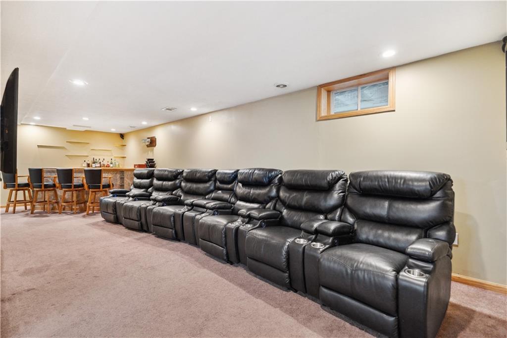 122 Walnut Circle Elizabeth, PA 15037 - Photo 27 of 50 a media room with lots of chairs and a projector screen