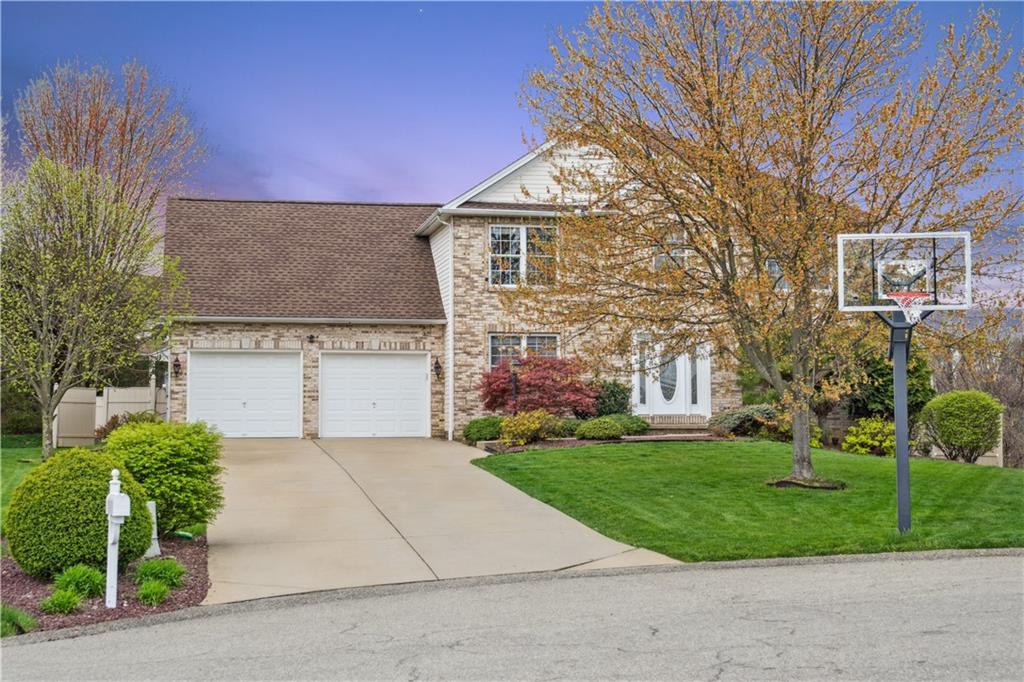 122 Walnut Circle Elizabeth, PA 15037 - Photo 50 of 50 a front view of a house with a garden and trees