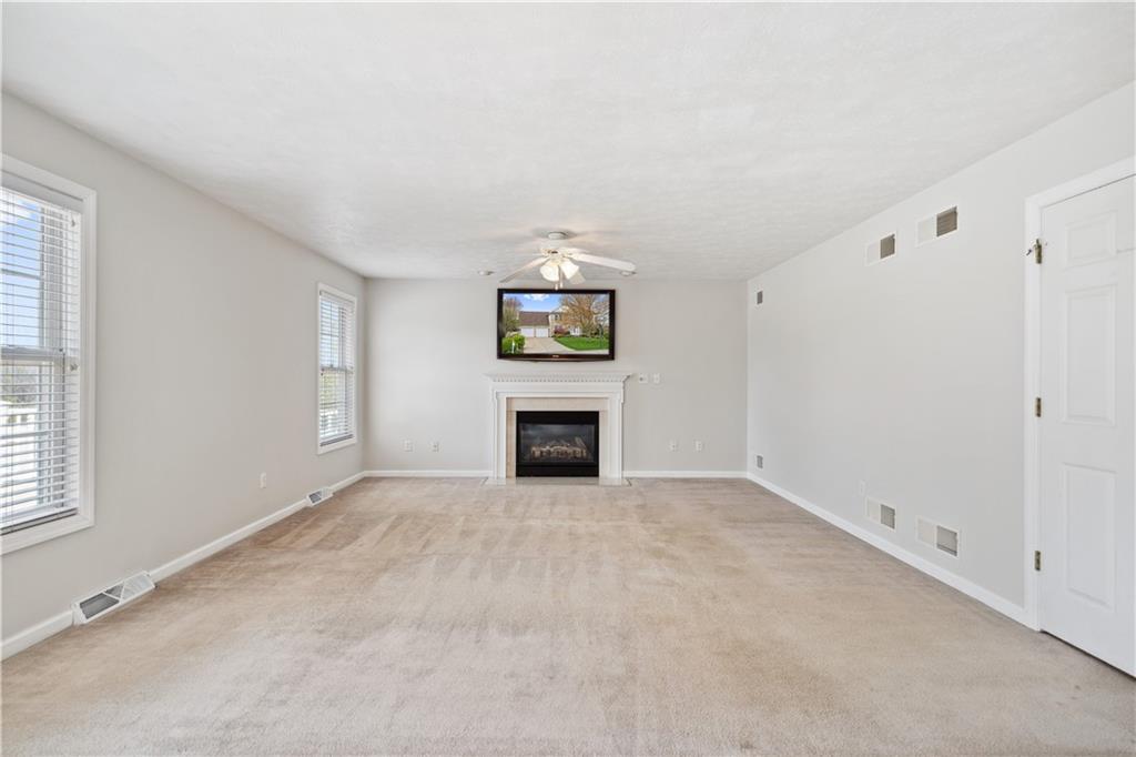 122 Walnut Circle Elizabeth, PA 15037 - Photo 7 of 50 an empty room with a fireplace and window