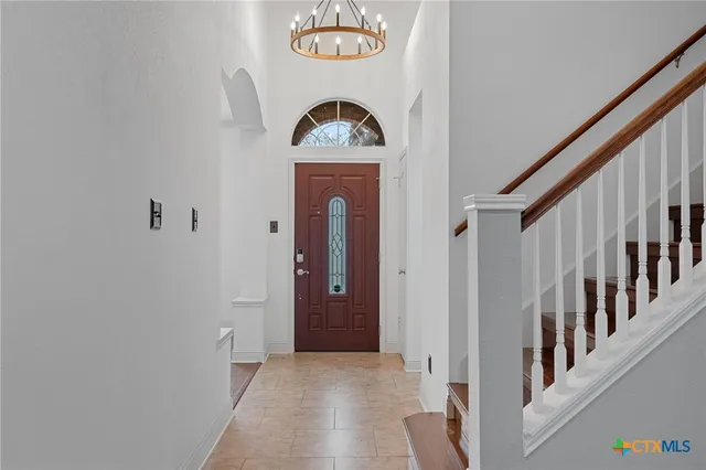 a view of hallway with door