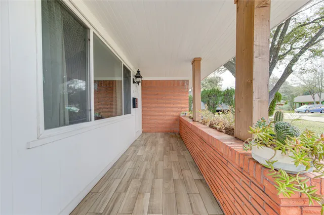 a view of balcony and yard