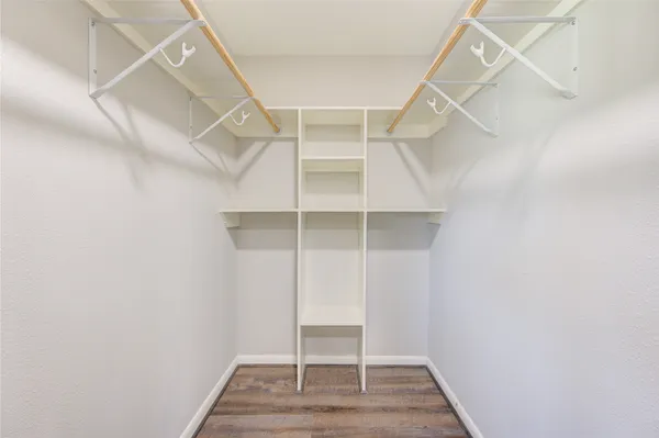 a view of an empty walk in closet