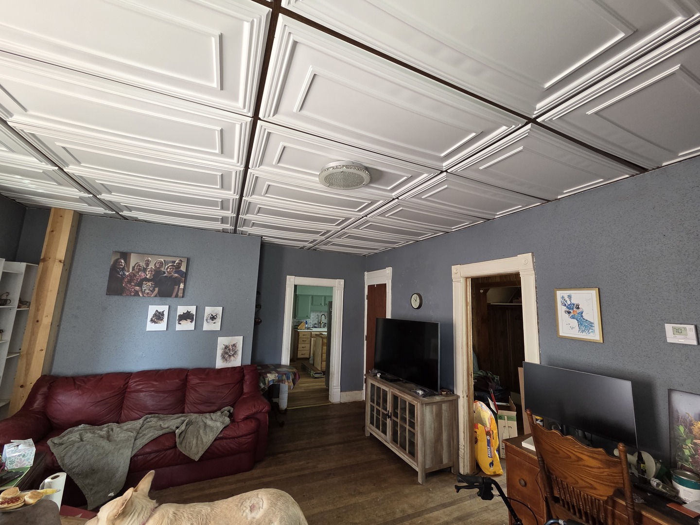 335 6th Avenue North Clinton, IA 52732 - Photo 2 of 23 a living room with furniture and a flat screen tv