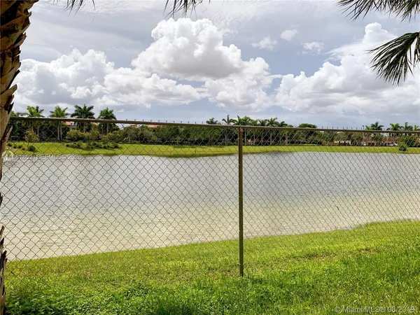 a view of a lake from a yard