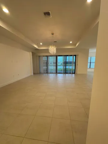 a kitchen with stainless steel appliances a sink stove and cabinets