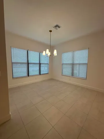 a bathroom with a sink and a large mirror