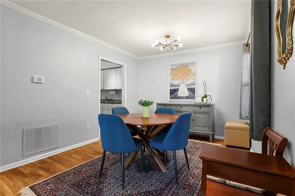 a view of a dining room with furniture