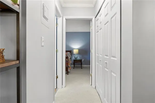 a view of a livingroom from a hallway