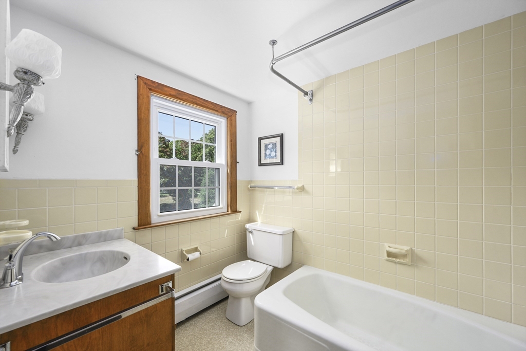 216 Forest Beach Road Chatham, MA 02659 - Photo 18 of 42 a bathroom with a sink toilet and shower