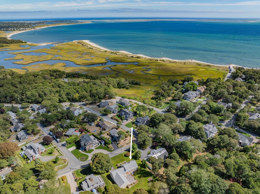 216 Forest Beach Road Chatham, MA 02659 - Photo 2 of 42 a view of a houses with a lake view
