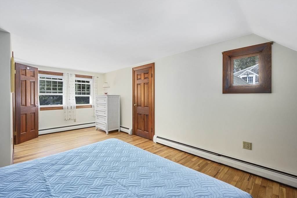 216 Forest Beach Road Chatham, MA 02659 - Photo 21 of 42 an empty room with windows