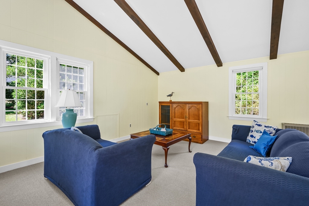 216 Forest Beach Road Chatham, MA 02659 - Photo 26 of 42 a living room with furniture and a window