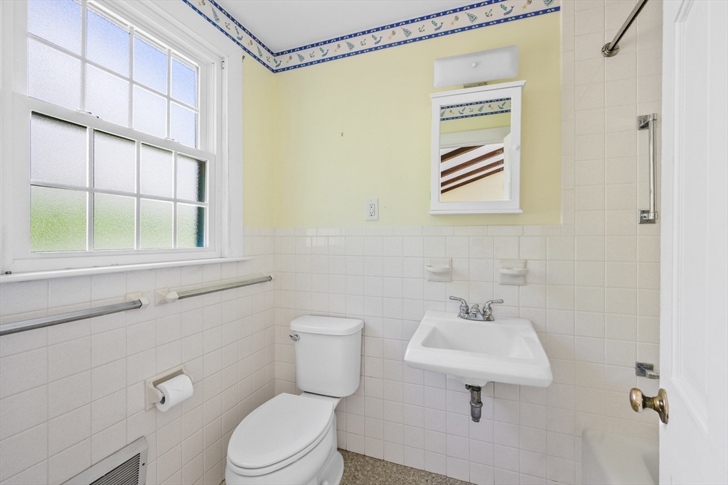 216 Forest Beach Road Chatham, MA 02659 - Photo 29 of 42 a bathroom with a sink toilet and shower