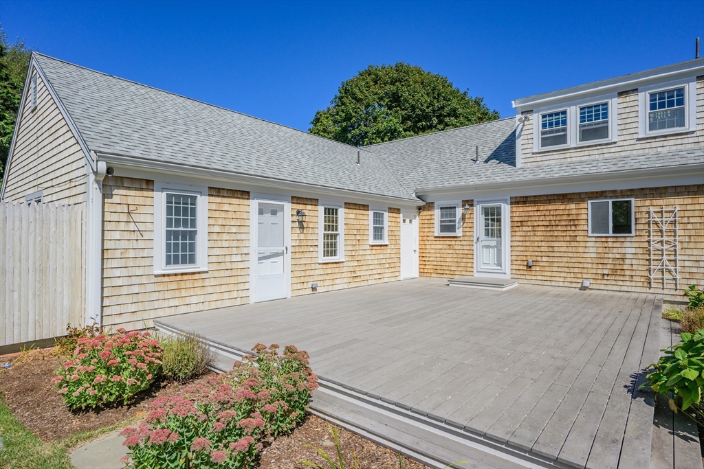 216 Forest Beach Road Chatham, MA 02659 - Photo 33 of 42 a house view with a garden space
