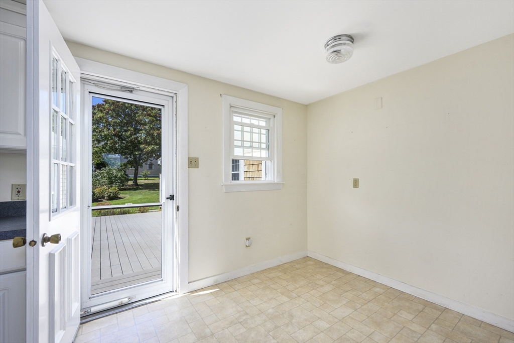 216 Forest Beach Road Chatham, MA 02659 - Photo 10 of 42 a view of an empty room with a window