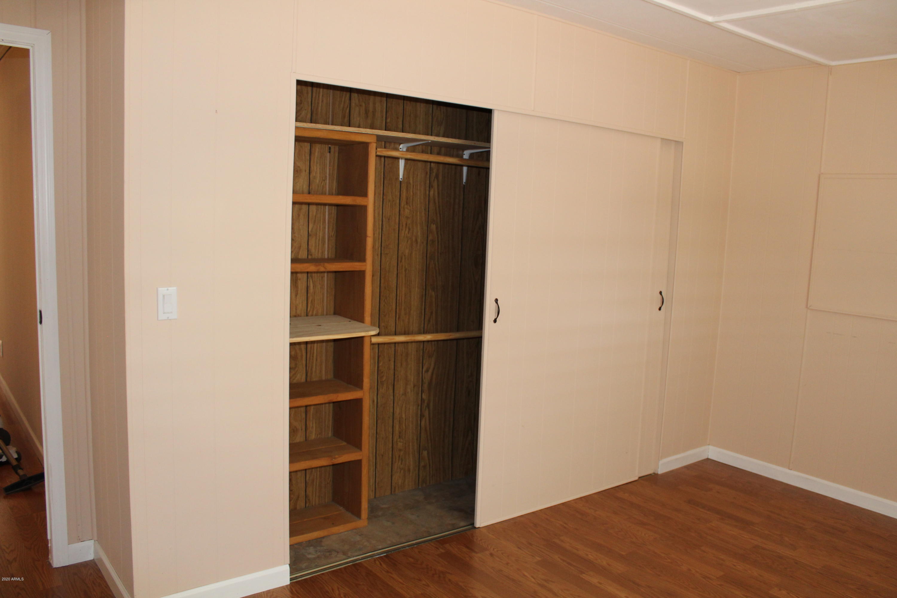 301 South Signal Butte Road, Unit 626 Apache Junction, AZ 85120 - Photo 15 of 28 a view of an empty walk in closet