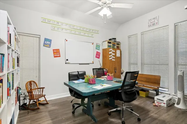 a workspace with furniture and rug