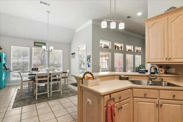 a view of a kitchen area with furniture and window