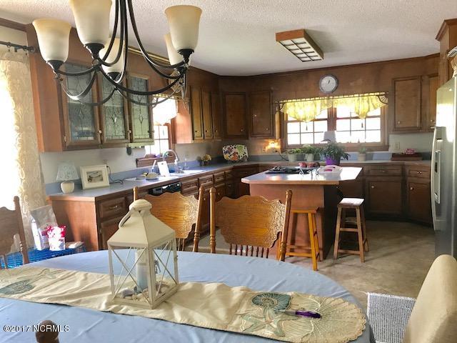 1621 Cameron Langston Road Kinston, NC 28501 - Photo 6 of 19 1621 Cameron Langston kitchen den combo