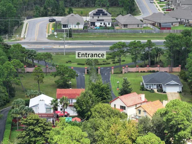 an aerial view of a house with outdoor space pool patio and outdoor seating