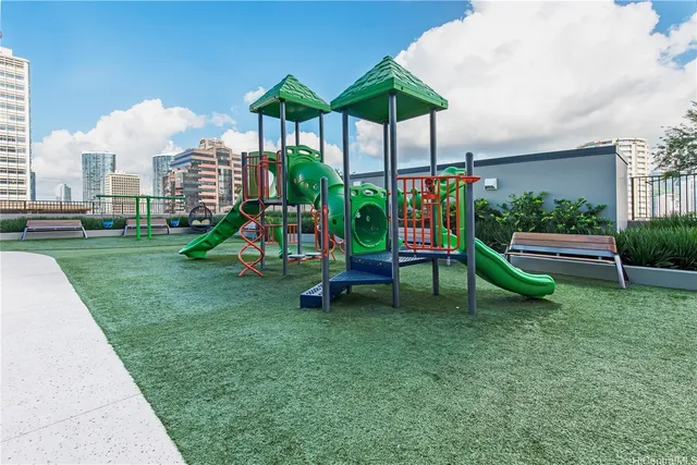 a view of a table and chairs in the garden