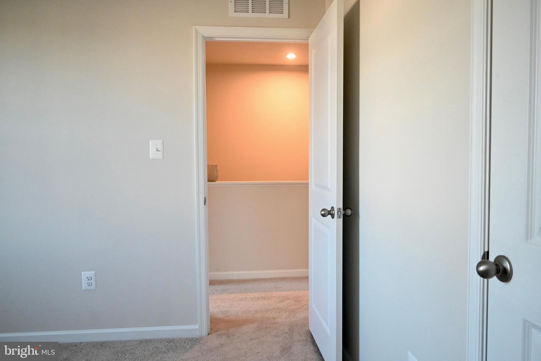 110 Mariners Way Cambridge, MD 21613 - Photo 23 of 41 Inviting entry to a serene, light-filled space.