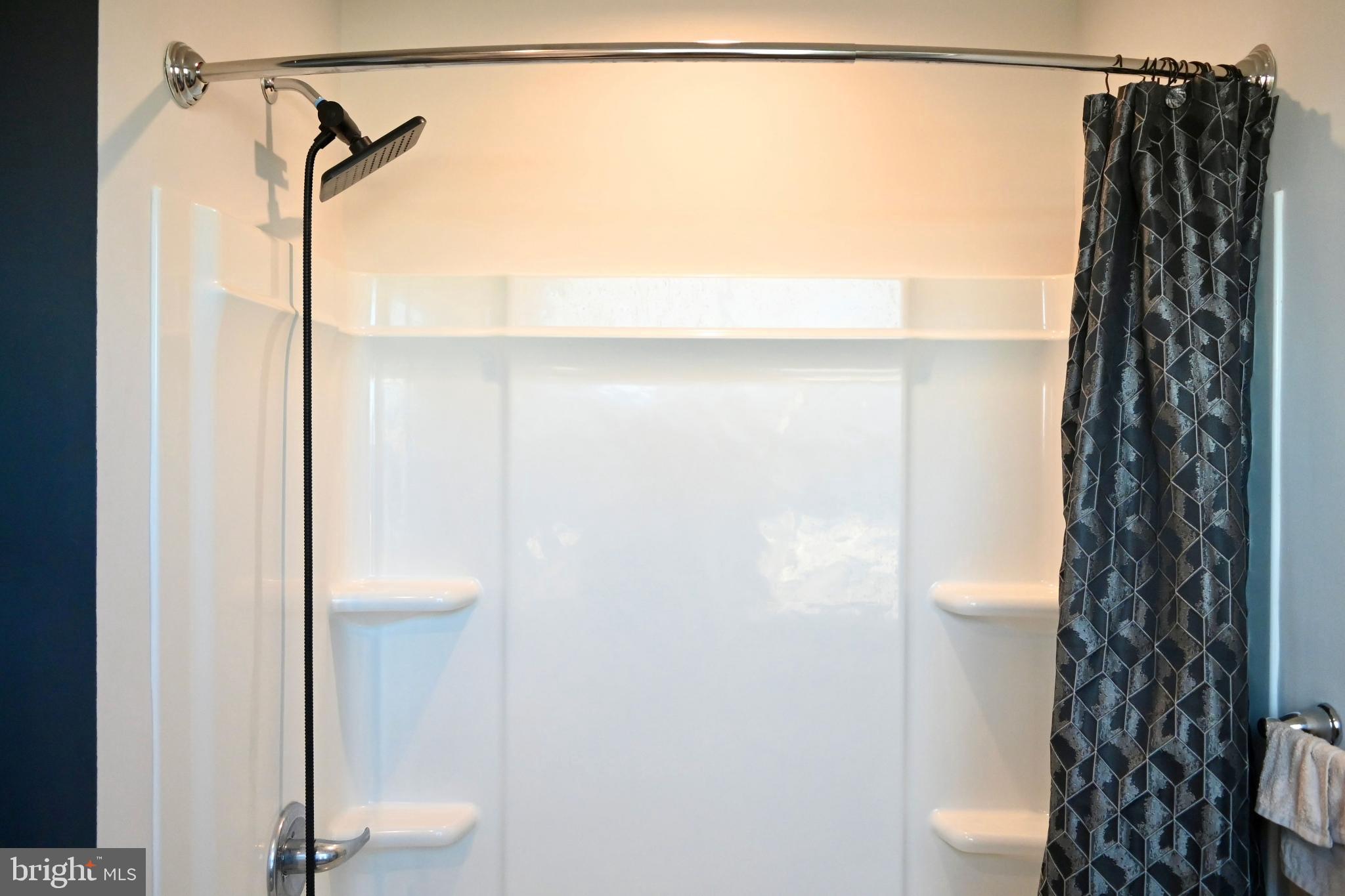 110 Mariners Way Cambridge, MD 21613 - Photo 34 of 41 Sleek shower space with modern design.