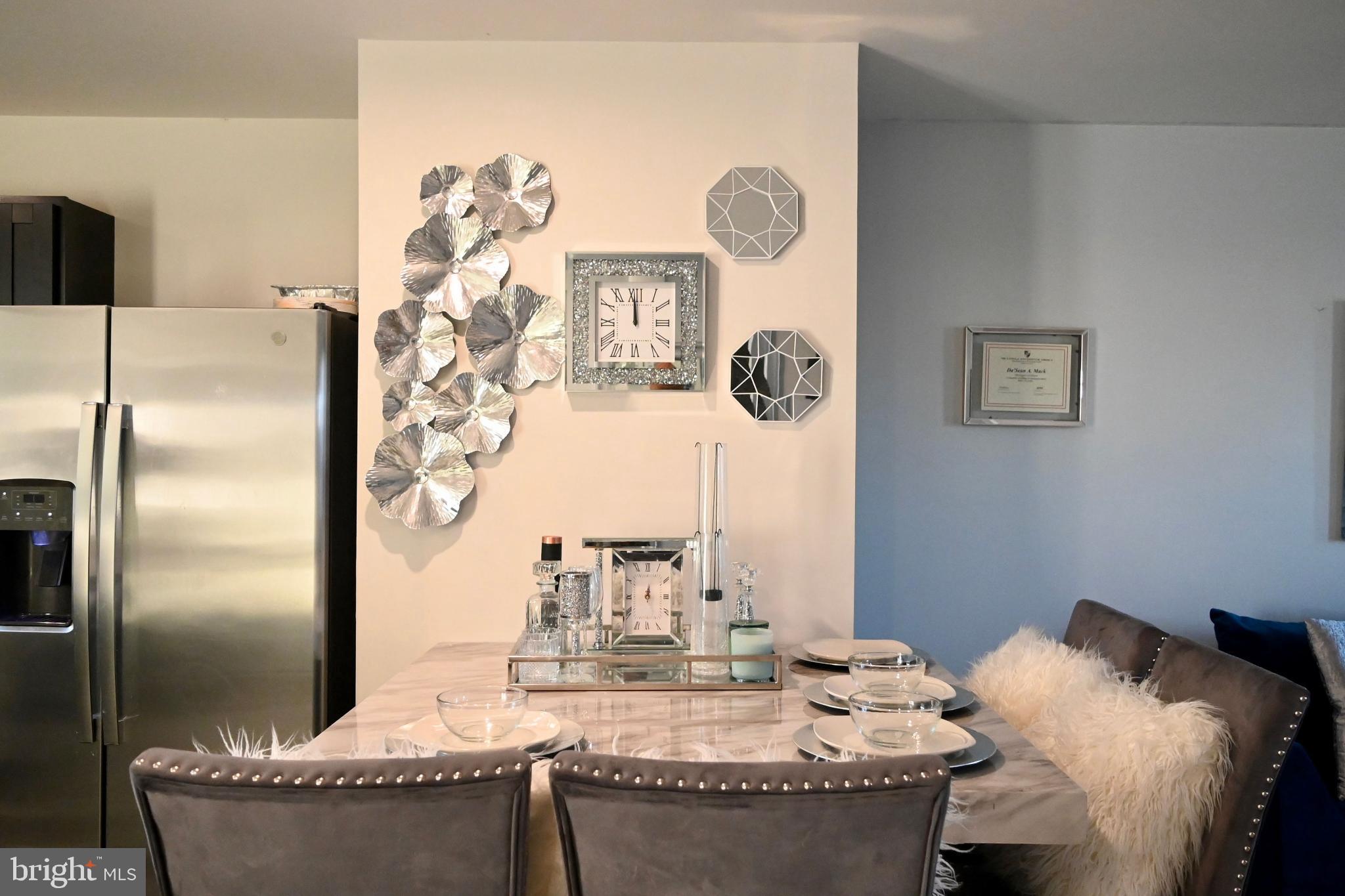 110 Mariners Way Cambridge, MD 21613 - Photo 10 of 41 Chic dining area with modern decor accents.