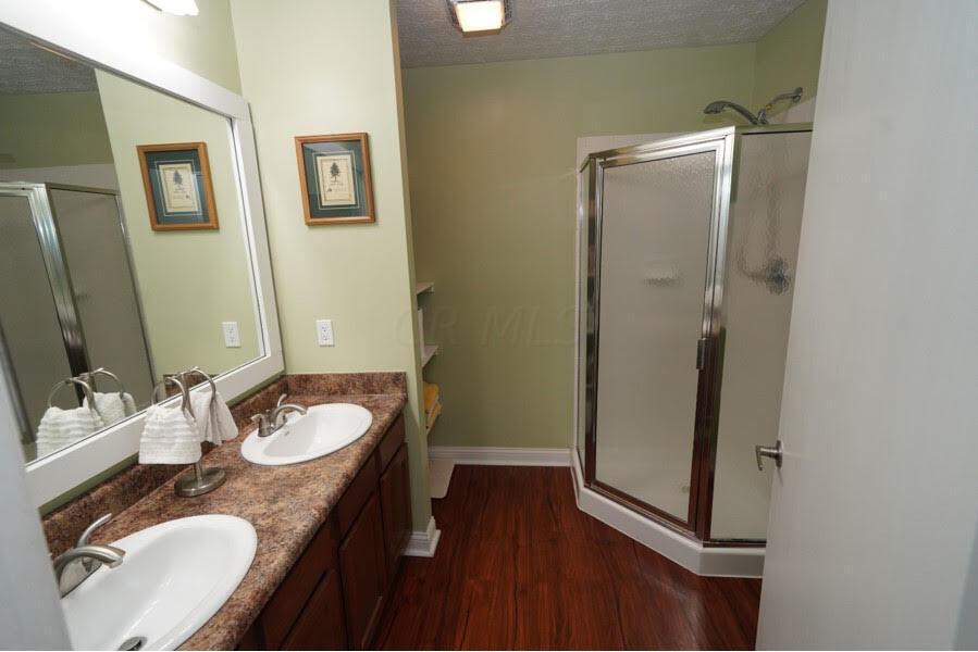 2383 Willowside Lane Grove City, OH 43123 - Photo 13 of 22 Owner's bathroom with double sinks and stand up shower...