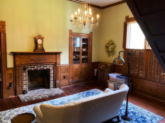292 High Street Morrison, TN 37357 - Photo 14 of 39 a living room with furniture a fireplace and a chandelier