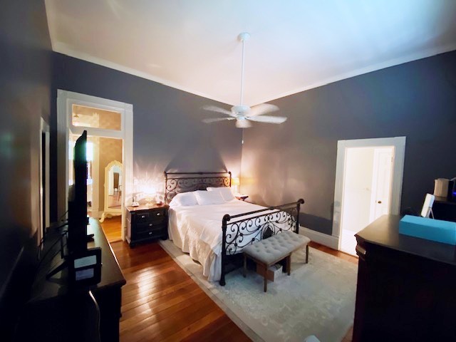 292 High Street Morrison, TN 37357 - Photo 23 of 39 a bedroom with a bed and a dresser in it